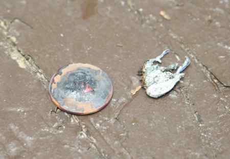 Melted penny (right) and fried quarter (left).
